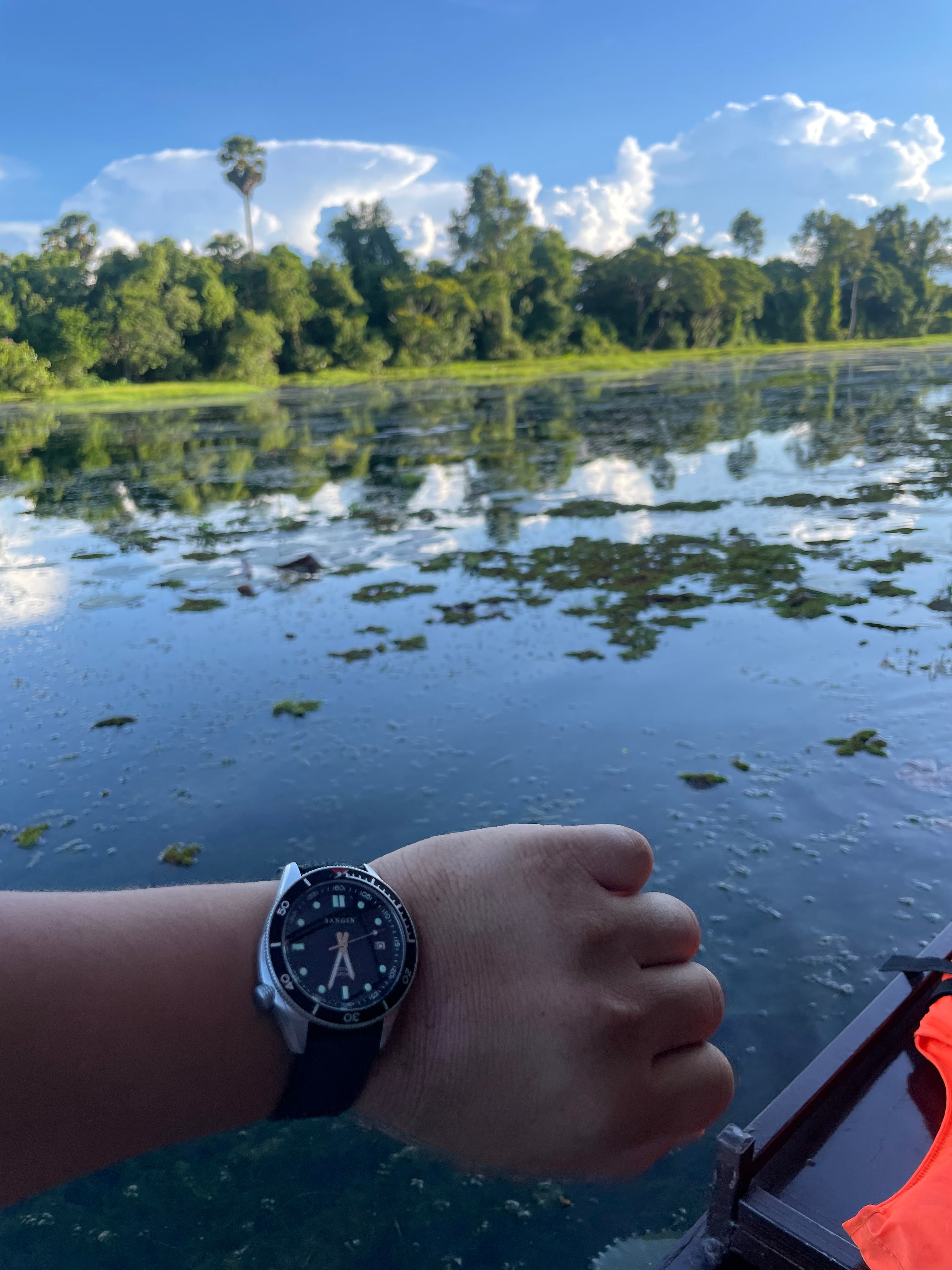 First time visiting the motherland (Cambodia). This was taken on a boat ride in the canals outside Angkor Wat with my family. The Neptune is my second Sangin. I started with an Atlas I passed to a Marine buddy. Lots of memories with that one, too. With you.